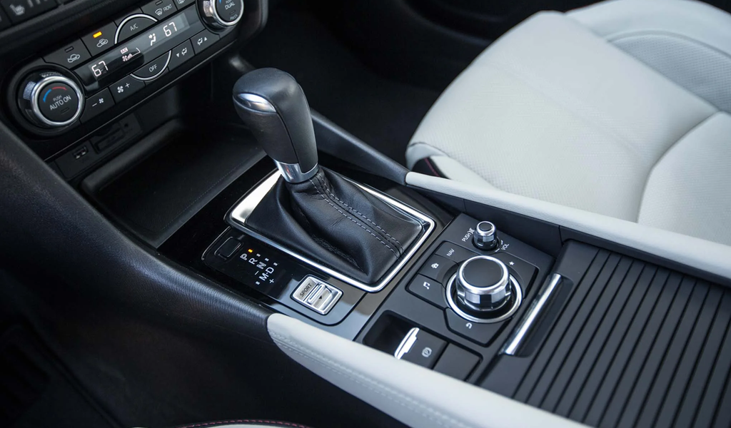What is the automatic transmission warning on a Mazda?